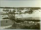 Slind.Statens Järnvägar, SJ. Brobygget över Skellefte älv i mars 1910.