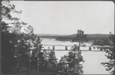 Vy  över bro över Ume älv, med landsvägsbron från Korpberget.