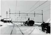 Snöskottning på bangården och vid stationen.