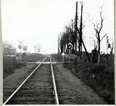 Järnvägskorsning vid Östra Ljungby Kyrka, på sträckan mellan Stidsvig och Östra Ljungby.