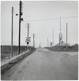 Järnvägsövergång vid infarten till Gyllebo station, på sträckan mellan S:t Olof och Gärsnäs.