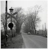 Järnvägsövergång vid Vinnö, på sträckan mellan Färlöv och Karpalund.