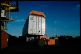 Lastning med containertruck.