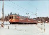 Trafikaktiebolaget Grängesberg - Oxelösunds Järnvägar, TGOJ Yoa104 rälsbusståg på linjen mellan Mellösa och Flens Övre under vintertid.