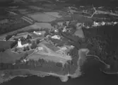 Flygfoto över Södra Hestra kyrka i Broaryd, Jönköpingslän. Nr M 647