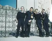 Roland Burman längs t.h med 3 kollegor