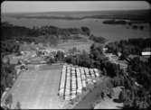 Flygfoto över Ohs Bruk i Värnamo kommun. Nr. H. 1854.