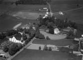 Flygfoto över Höreda och Höreda kyrka i Eksjö kommun. Nr P 208