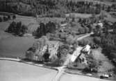 Flygfoto över Vireda kyrka i Aneby kommun. Nr R 636.