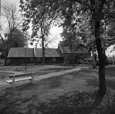 Trähus och stenhuset S:t Karins kapell i Ahllöfsparken