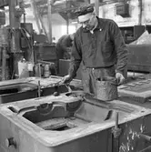 Arbetare på gjuteriet på AMV