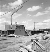 Byggnadsfirma Lunds nybygge på Brattberget
Lyftkran, tegel, rör