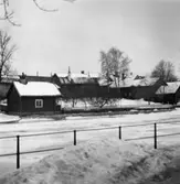 Crugska gården, södra sidan av ån.
Vinter och snö.