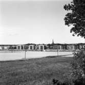 Vy. Bilden är tagen från Brattberget och visar flerfamiljshus på Munkgatan.
E 18