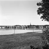 Vy. Bilden är tagen från Brattberget och visar flerfamiljshus på Munkgatan.
E 18