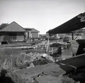 Figeholms skärgård, Örö sjöbodar och bryggor med förtöjda båtar.