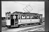 Sundbybergsbanan tillhörande Aktiebolaget Stockholms Spårvägar, A2f 122, Sundbybergsbanan. Fotograferad vid Hagalund järnvägsstation.