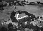 Flygfoto över Forserums kyrka i Nässjö kommun, Jönköpings län.  Nr: 1195/1957