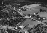 Flygfoto över Korsberga i Vetlanda kommun, Jönköpings län.  Nr: 1210/1957