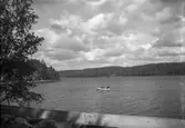 Vy över en sjö i Hällesåker, juni 1957.