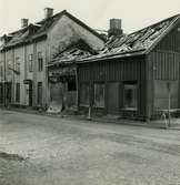 Västerås. Hantverkargatan. Raserad byggnad i hörnet mot Torggatan (brand?). 1963.