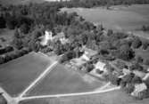 Flygfoto över Järstorps kyrka i Jönköpings kommun. Nr: 267/1959