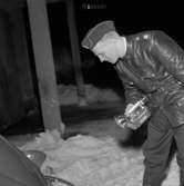 Polisjakt om natten. 
24 januari 1959.