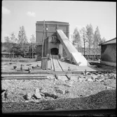Byggnad för lastning till godsvagnar vid Åmmerbergs Järnväg, ÅJ.