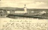 Vykort med motiv av bron över sjön och kyrkan i Stöde.
