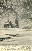 Vykort med vintermotiv över Gustav Adolfs kyrka.