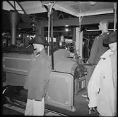 Troligen Trafikaktiebolaget Grängesberg – Oxelösunds Järnvägar, TGOJ ångloksmodell i Scania-Vabis klädbutik.