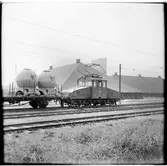 Helsingborgs Stads Spårvägar, HSS lok 1 med godståg utanför Kopparverket på väg mot Statens Järnvägar, SJ.