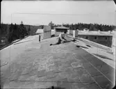 OPUTSAD FASAD MED ETERNITBRÖSTNINGAR + TAKLÄGGNING