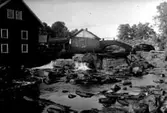 Kvarnen vid Flian och bron över ån för vägen Ardala-Norra Vånga vid Blombacka.