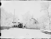 Bostadshus i vinterskrud, Östhammar, Uppland