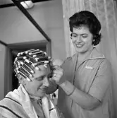 Frisörsalong.
13 mars 1959.