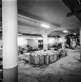 Byggnad 19 på pappersbruket Papyrus i Mölndal, 16/7 1966. Förstärkning av bjälklag genom megapålning.