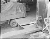 LASTBRYGGOR, KAJER, TRANSPORTANORDNINGAR I KONSUMHUSET