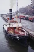 Bogserbåten Primus vid kajen.