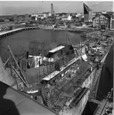 Kryssaren Göta Lejon
Kryssaren Göta Lejon under ombyggnad.\\Anm. I bakgrunden gamla mastkranen samt 