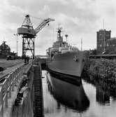 Varvet runt- en bildutställning
Minfartyget Älvsnabben - Flottans gamla trotjänare - under neddockning i Oscarsdockan på 1960-talet.