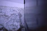 En närbild av Ymers skrov som bryter is.