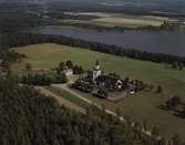 Flygfoto över Flisby kyrka i Nässjö kommun, Jönköpings län 283/1969