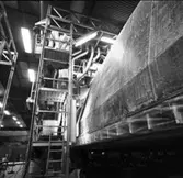 M 80
Arbetsställningar kring M 80 och plastning av däcket