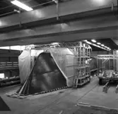 M 80
Arbetsställningar kring M 80 och plastning av däcket