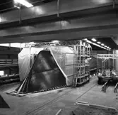 M 80
Arbetsställningar kring M 80 och plastning av däcket