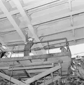 Arbetsbilder på Baltic Print i botten och maskinrum