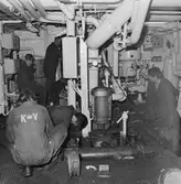 Arbetsbilder på Baltic Print i botten och maskinrum