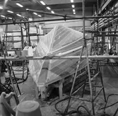 Stridsbåt CG13 i plastverkst.