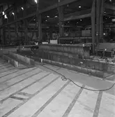 Arbete med bostadsplattformar till oljerigg och lyft till pråm för transport